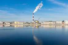 Industrial St. Petersburg - March 17, 2020 Heat Station Pipes, Smoke. Smoking Chimneys On The Blue Sky Background. The Heating Season, Modern Global Warming.