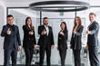© newagecinema - Successful business people with a thumbs up and a smile