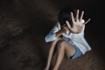 Wall Mural - Woman's hand extended signaling to stop useful to campaign against violence, gender or sexual discrimination