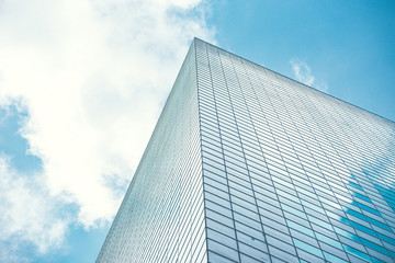 underside panoramic and perspective view to steel blue glass high rise building skyscrapers, business concept of successful industrial architecture