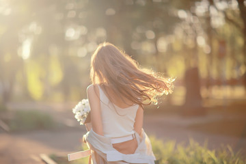 wind long hair summer girl portrait / freedom, happiness, independence, tourist travel young girl