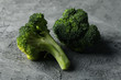 Broccoli on grey background, close up. Healthy food