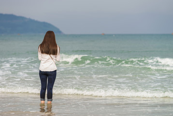 Young girl at China Beach in Danang in Vietnam