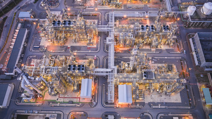 Wall Mural - Aerial view of Oil refinery plant in twilight time, Petrochemical industry is important to the global economy.