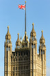 © spacekris - The Union Jack flag on top of the Victoria Tower in London, United Kingdom.
