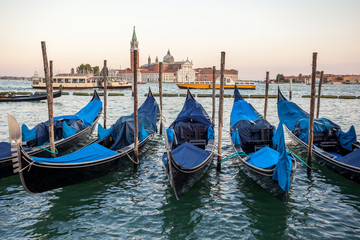 Wall Mural - Gondolas moored by Saint Mark square with San Giorgio di Maggiore church, Venice