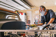 © Raymond Forbes LLC/Stocksy - Retired Senior Citizen Working on his Custom Car Hobby