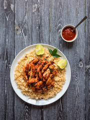 Wall Mural - Spicy Chicken fry with basmati rice. South India dish