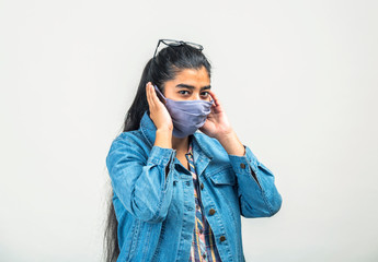 Wall Mural - A teenager girl with mask  while quarantine during covid-19 pandemic