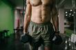 © AD Photography/Stocksy - Muscular Man Working Out