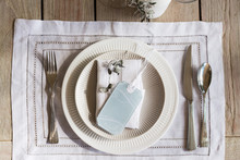 Table Setting With Blue Tag And Dry Gum Leaf