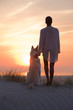 © Amsterdam/Stocksy - woman with dog