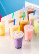 © Jeremy Pawlowski/Stocksy - Colorful Bubble Boba Tea