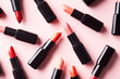 © 365mm/Stocksy - Chaotic layout of shiny lipsticks