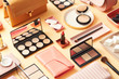 © 365mm/Stocksy - Assorted layout of cosmetics and accessories