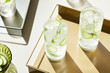 © 365mm/Stocksy - Transparent glasses of mocktail with ice