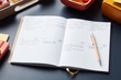 © 365mm/Stocksy - Weekly planner with handwritten notes