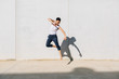 © Marc Bordons/Stocksy - A dancer dancing in front of a concrete wall