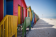 Wide Angle View Of The Colourful Beach Huts On Muizenberg Beach In Cape Town South Africa