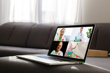 Canvas Print - Boy video conferencing with tutor on laptop at home. Distance education concept.