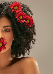 Wall Mural - Beauty afro girl with flowers in hair.