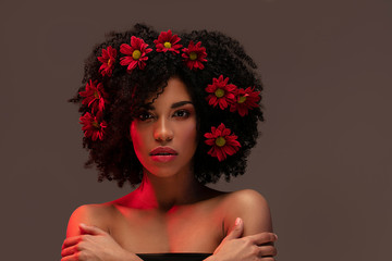 Wall Mural - Beauty afro girl with flowers in hair.