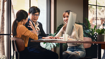 Wall Mural - business background of asian businesspeople having business conversation and meeting together as teamwork