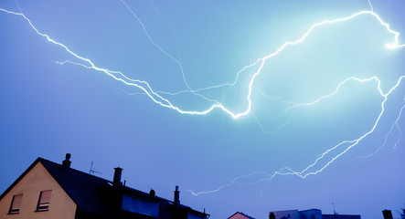 Wall Mural - lightning in blue sky before storm