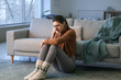 © Pixel-Shot - Depressed young woman at home