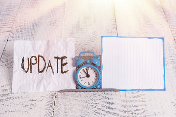 Wall Mural - conceptual hand writing showing update. concept meaning by adding new information or making correcti