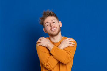 Attractive young guy with a yellow T-shirt