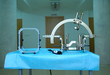 Surgical equipment for implantation of a neurostimulator placed on table. It is used for deep brain stimulation for patients with torsion distonia