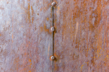 Wall Mural - rust on the metal sheet with the remnants of blue paint. Rusty abstract texture. Rust through the paint.