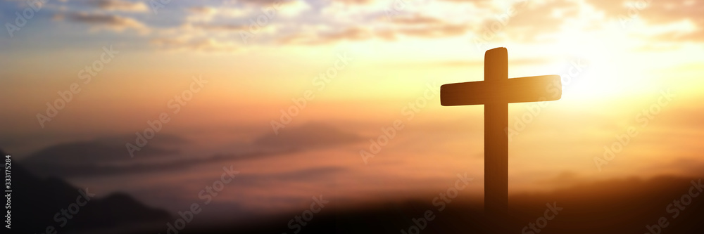 Silhouette of catholic cross at sunset background. panorama picture - obrazy, fototapety, plakaty 