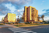 Fototapeta Łazienka - Apartment house home residential building complex street parking sunset