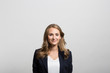 © Fotosushi - studio portrait of a happy businesswoman