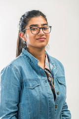 Wall Mural - Portrait of a young confident teenager girl with spectacle