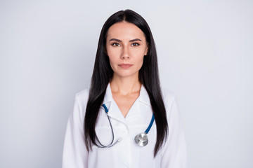 Wall Mural - Photo of attractive doctor practitioner lady meet patients consultation not smiling reliable person wear white lab coat stethoscope isolated grey color background