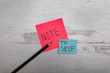 © Rebecca - note to self message on post notes white wooden background