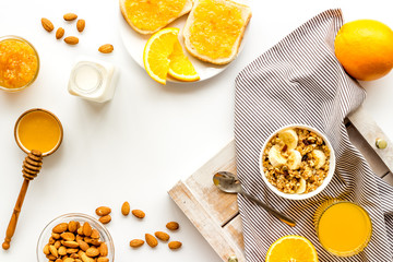 Wall Mural - Breakfast with granola mockup on white background top-down copy space