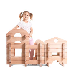 Wall Mural - Little girl playing with take-apart house on white background