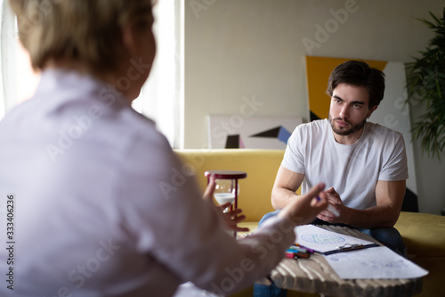 Cuadros en Lienzo Counselor explaining psychotherapy test results to serious client