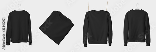 Fotografía Mockup of black textile sweatshirt hanging on a hanger and rope, isolated on a white background