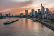 Sunset over Frankfurt skyline, main river view 