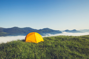 Wall Mural - Tourist camping tent in a mountains. Carpathian, Ukraine, Europe. Beauty world.