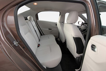 The White Rear Seat Of A Luxury Passenger Car