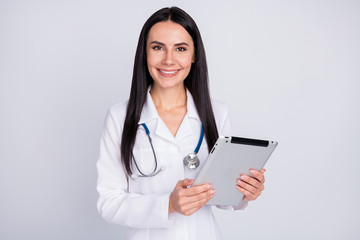 Poster - Photo of beautiful cheerful professional doc lady writing patient digital contract insurance in modern e-book wear stethoscope white lab coat isolated grey color background