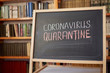 © Andrii - inscription stay at home. Outbreak Warning. written white chalk on blackboard in connection with epidemic of coronavirus worldwide.