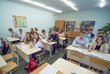 © Довидович Михаил - Students during the lesson are sitting at their desks. Russian school.