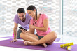 © Sergio - healthy boy and girl couple doing sport indoors bright and white